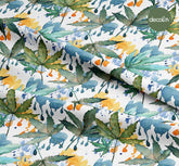 Digitally Printed Fabric with Watercolor Tropical Leaf Pattern on Paint Splattered Background
